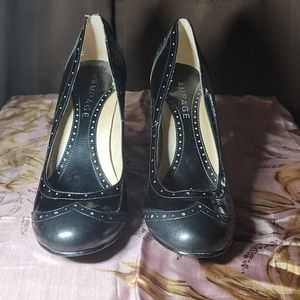 Black patent leather heels.